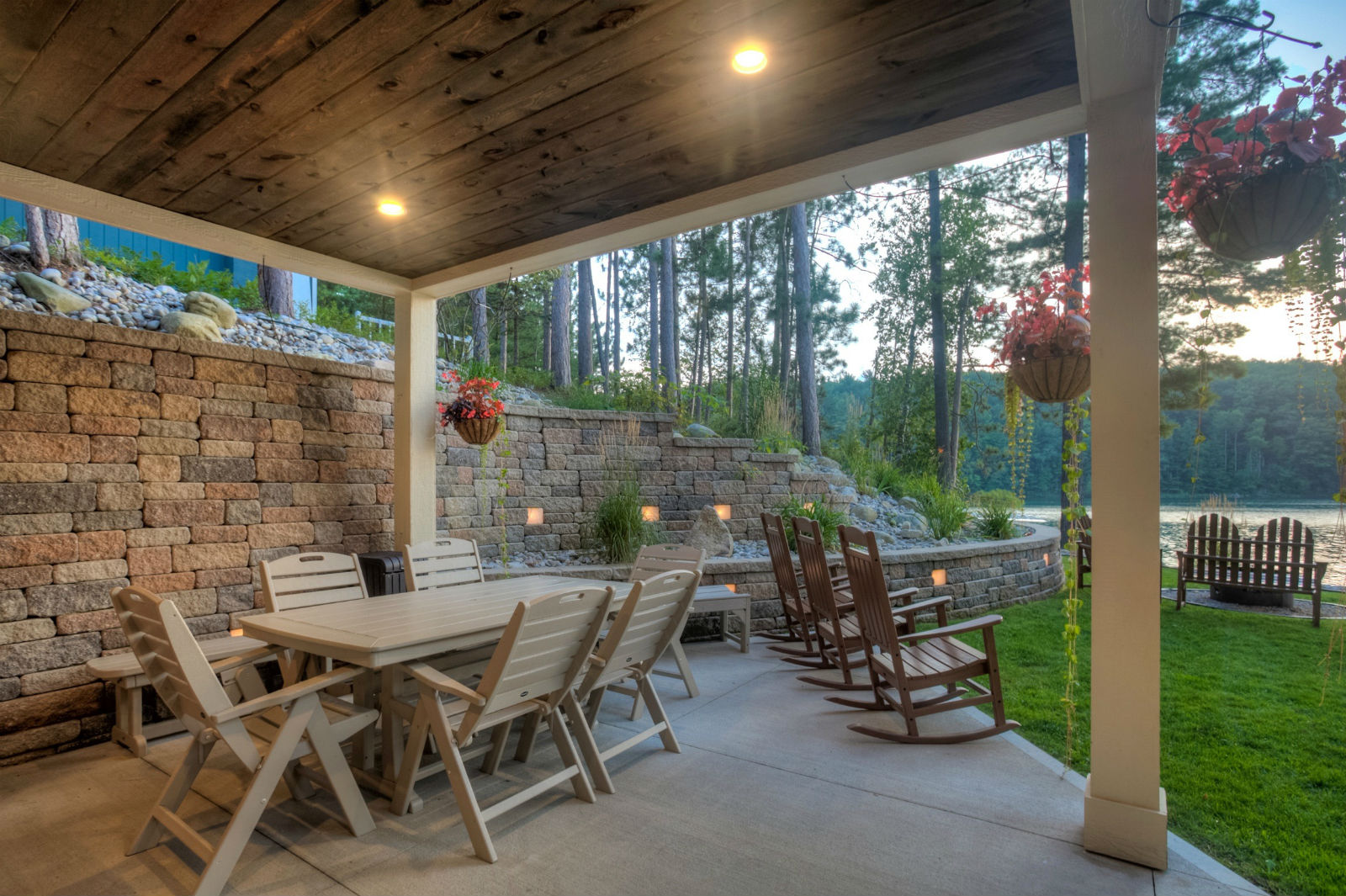 A large family gathered for dinner on the Lodge's covered lakeside porch